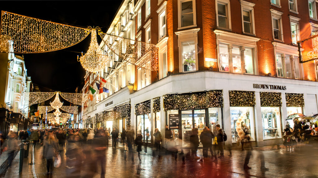 Grafton street at night looking at Brown Thomas with Christmas decorations up