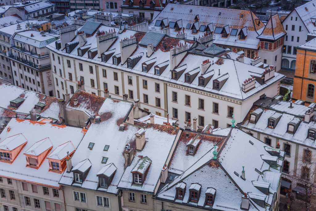 Snow capped roofs of residential houses in city of Geneva, Switzerland