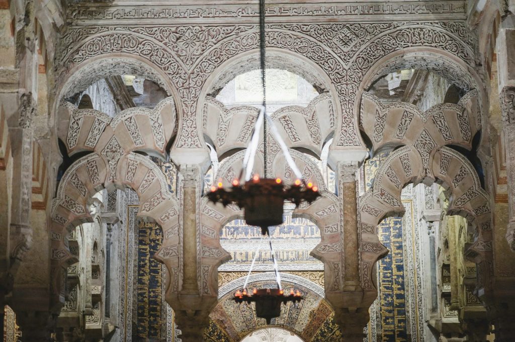 Intricate detail of the interior of a mosaic-filled, tiled religious building