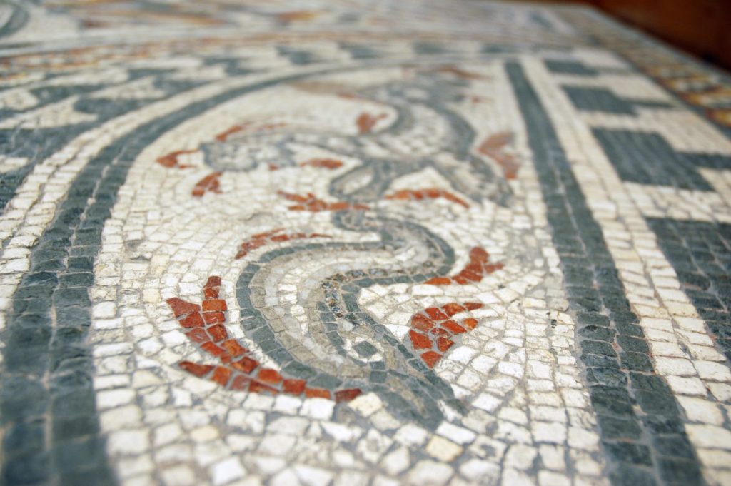 Sea creature on the Ancient Roman Hunting Dogs Mosaic from the Corinium Museum, Cirencester, England.