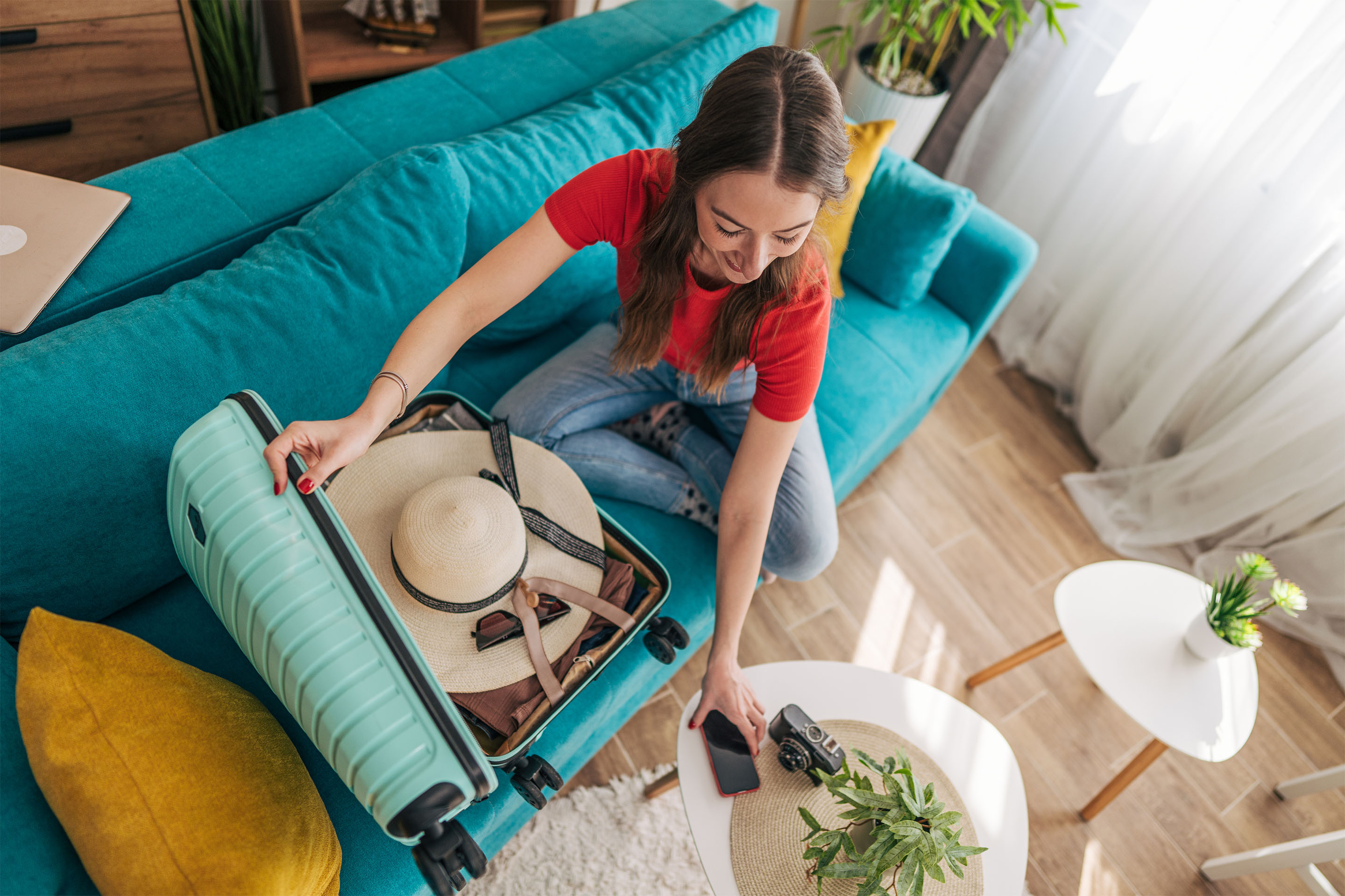 Woman packing a suitcase
