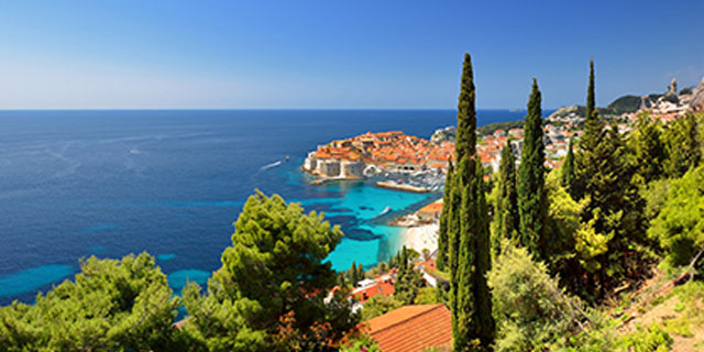 Hillside view over a seasode town on the Adriatic coast on a sunny day
