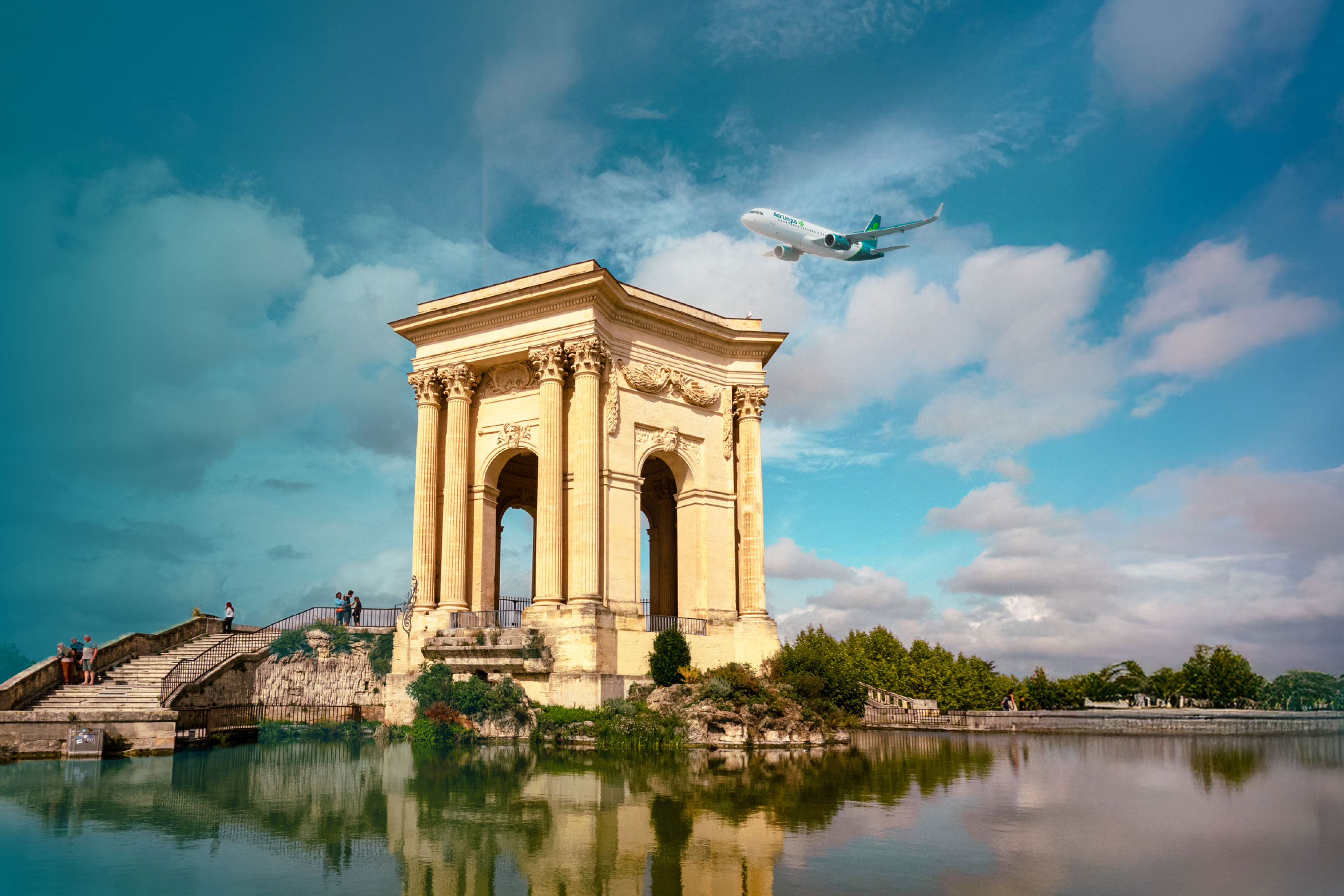 Aer Lingus plane flying above Arch in Montpellier, France